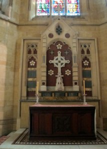 Altar of Lady Chapel. Lily themed kneelers visible in lower left corner